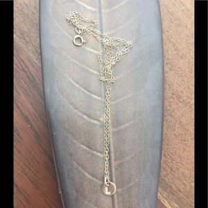 Tiny little “L” necklace